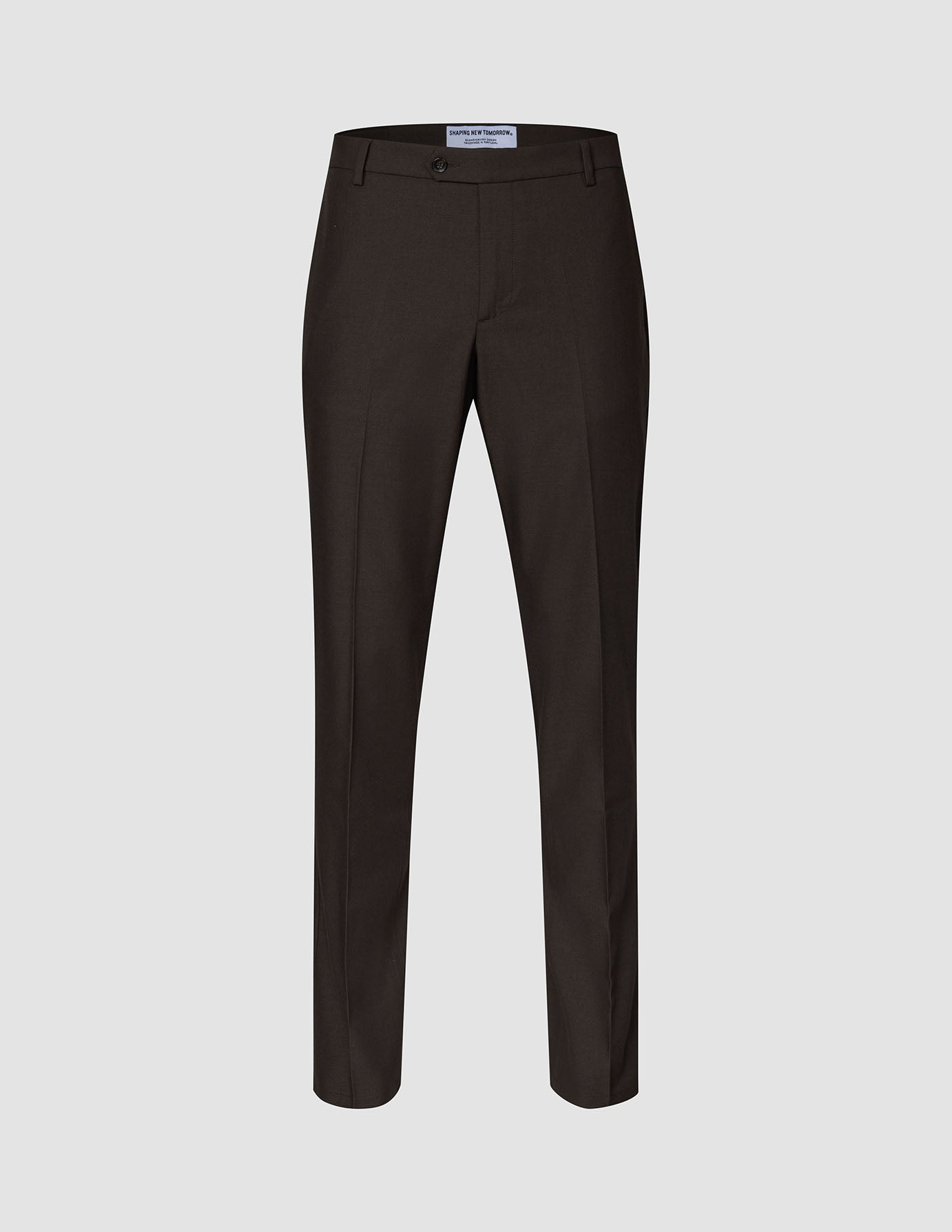 Motion Suit-bukse, Regular, Cognac: mørkebrune bukser med 360°-stretch, midtstrekk og knappelukking i linningen.